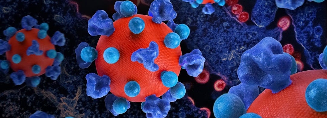 a group of blue and red balls on a black surface