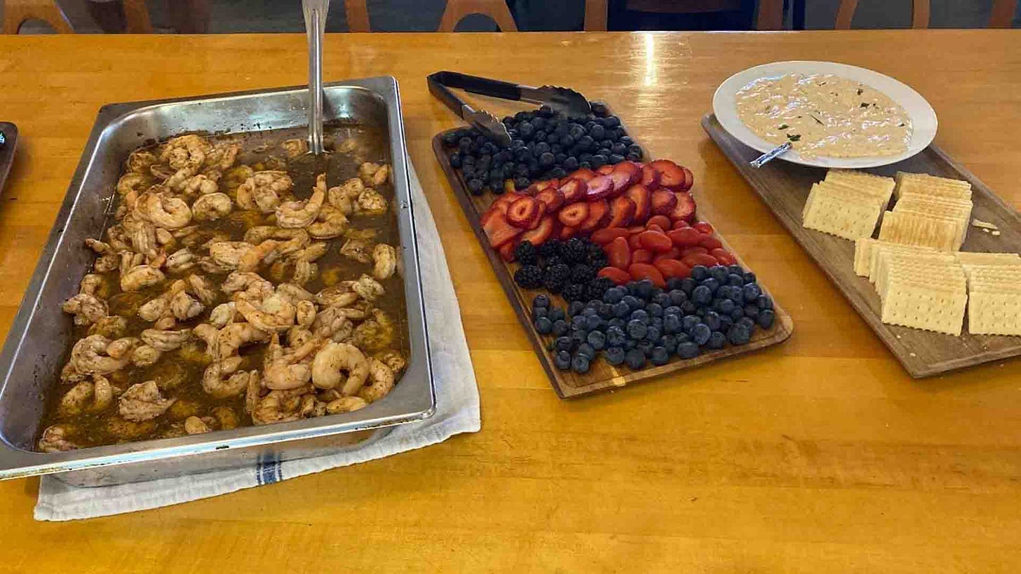 Appetizers of Shrimp, Blueberries, Crackers and Dip