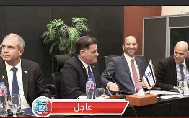 Israeli negotiators including Strategic Affairs Minister Ron Dermer (second left) and Gal Hirsch (left) are seen in a photo indicating success in the mediated Israel-Hamas negotiations on a Gaza hostage-ceasefire agreement in Sharm el-Sheikh, in the early hours of October 9, 2025. (Screenshot, via Telegram / used in accordance with clause 27a of the copyright law)