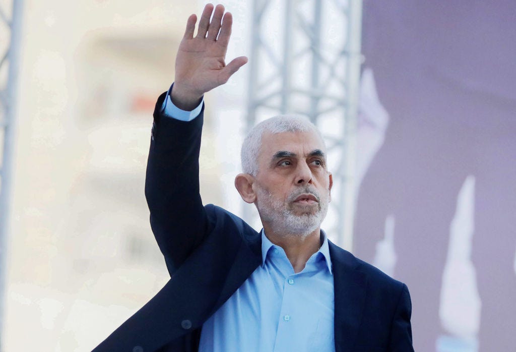 Yahya Sinwar, head of the Palestinian Islamic movement Hamas Yahya Sinwar, head of the Palestinian Islamic movement Hamas in the Gaza Strip, waves his hand to the crowd during the celebration of International Quds Day in Gaza City.