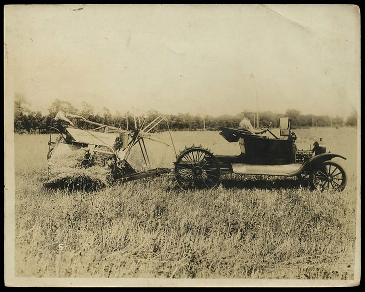 A farmer drives a Model T converted into a tractor, c. 1919 (source) A farmer drives a Model T converted into a tractor, c. 1919 (source)