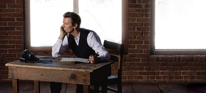 Left: Black-and white picture of dark-haired woman writing. Right: Color picture of blonde-haired man at desk writing.