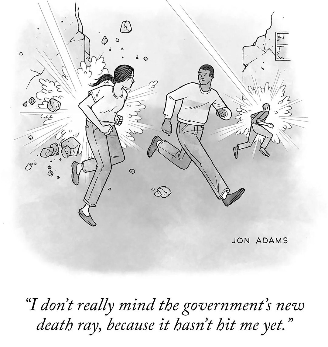 Two people are running as the city behind them gets zapped with rays coming from the sky. One person says to the other, “I don’t really mind the government’s new death ray, because it hasn’t hit me yet.”