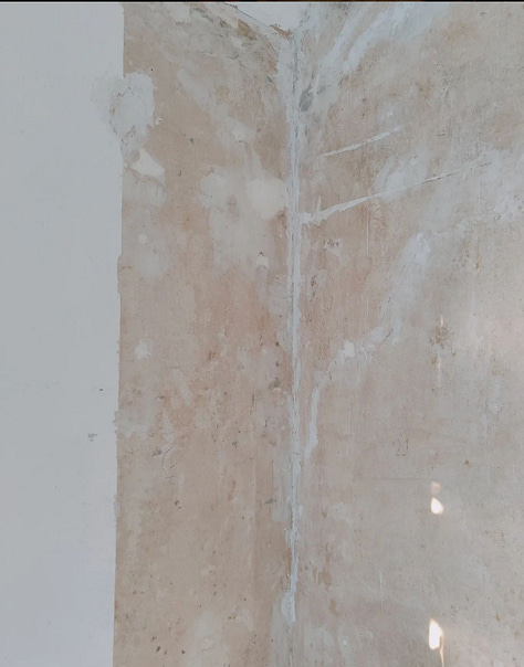 Various pictures showing various states of repairs from plugs being pulled out of the wall, to a wallpaper stripped wall with cracks, to.wall cracks being filled, to two freshly sanded floors and wall painted white