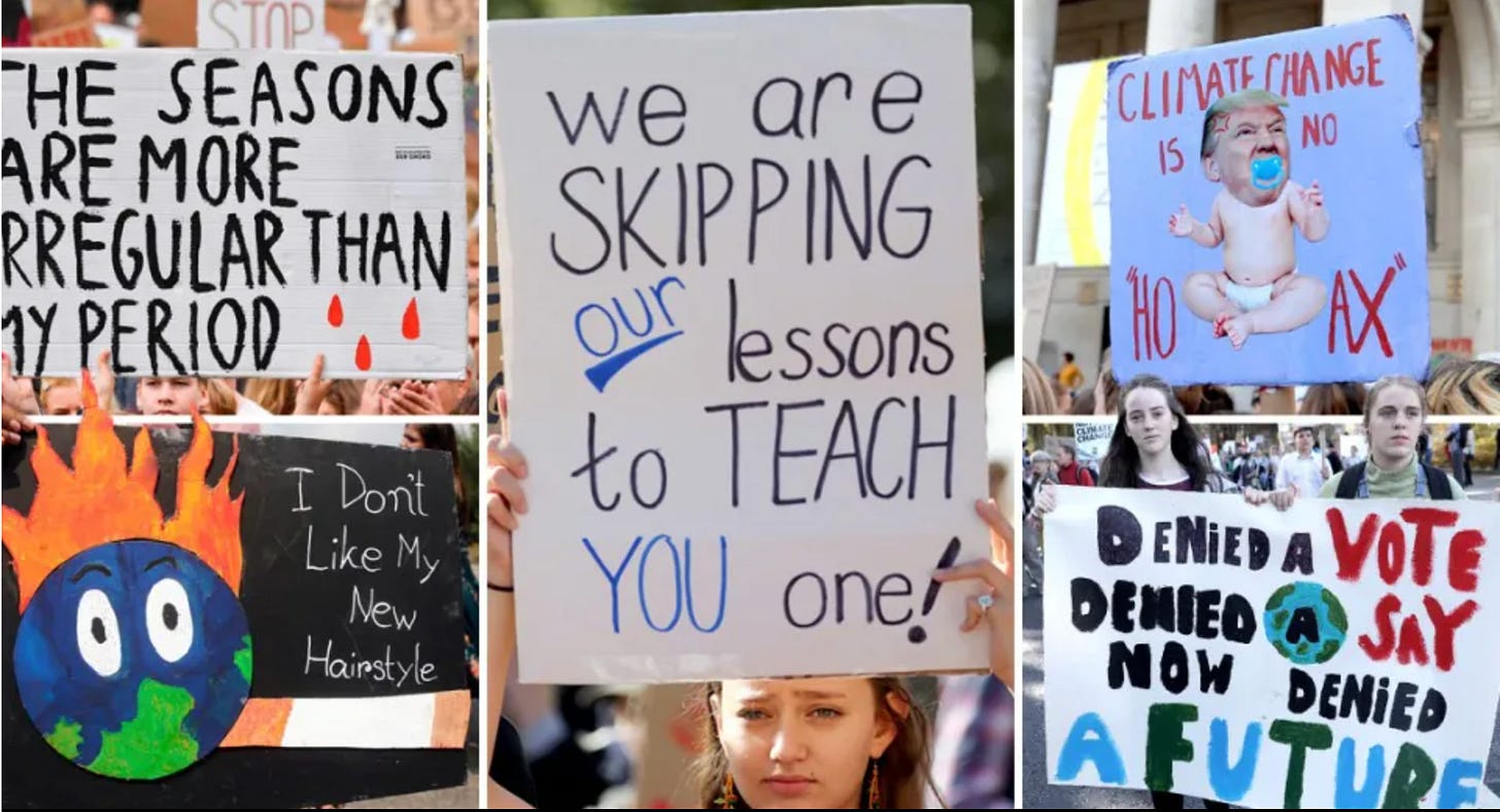 A group of people holding signs

AI-generated content may be incorrect.