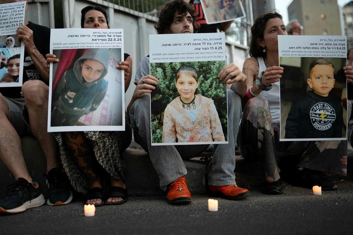 People holding up posters of people

AI-generated content may be incorrect.