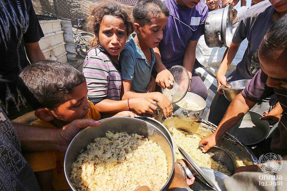 File:Displaced Palestinians in Deir el-Balah line up to receive food provided by charitable organizations.jpg File:Displaced Palestinians in Deir el-Balah line up to receive food provided by charitable organizations.jpg