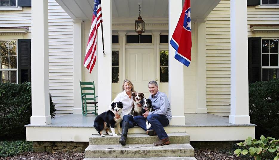 A person and person sitting on steps with dogs

AI-generated content may be incorrect.