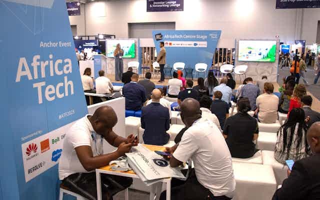 People listening at a conference