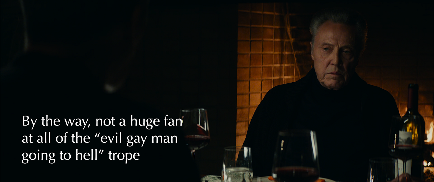 Outie Burt during the dinner with the fireplace behind him. A caption overtop that reads "by the way, not a huge fan at all of the "evil gay man going to hell" trope"