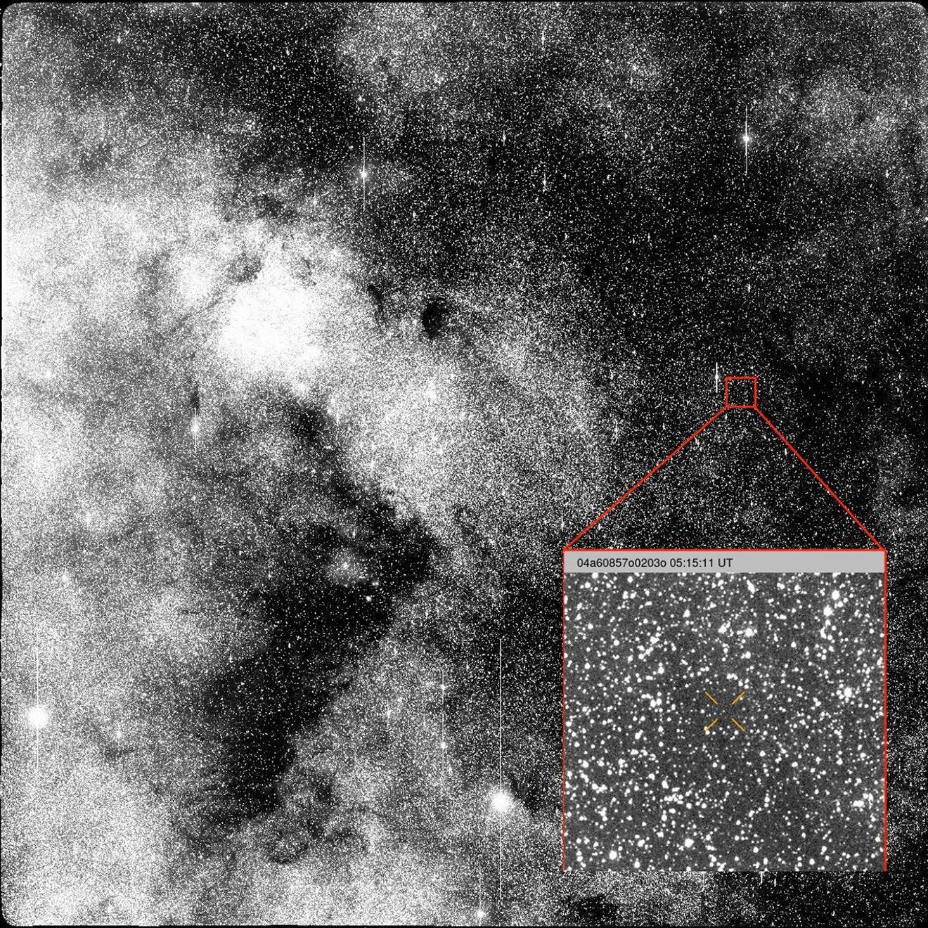 Black-and-white image of a dense star field with a zoomed-in inset highlighting a smaller region containing the marked third interstellar object, complete with an identification label and timestamp. Black-and-white image of a dense star field with a zoomed-in inset highlighting a smaller region containing the marked third interstellar object, complete with an identification label and timestamp.