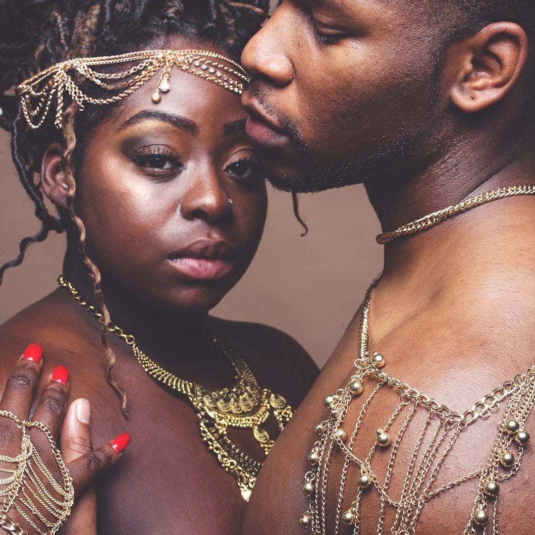 topless man and woman holding each other topless man and woman holding each other