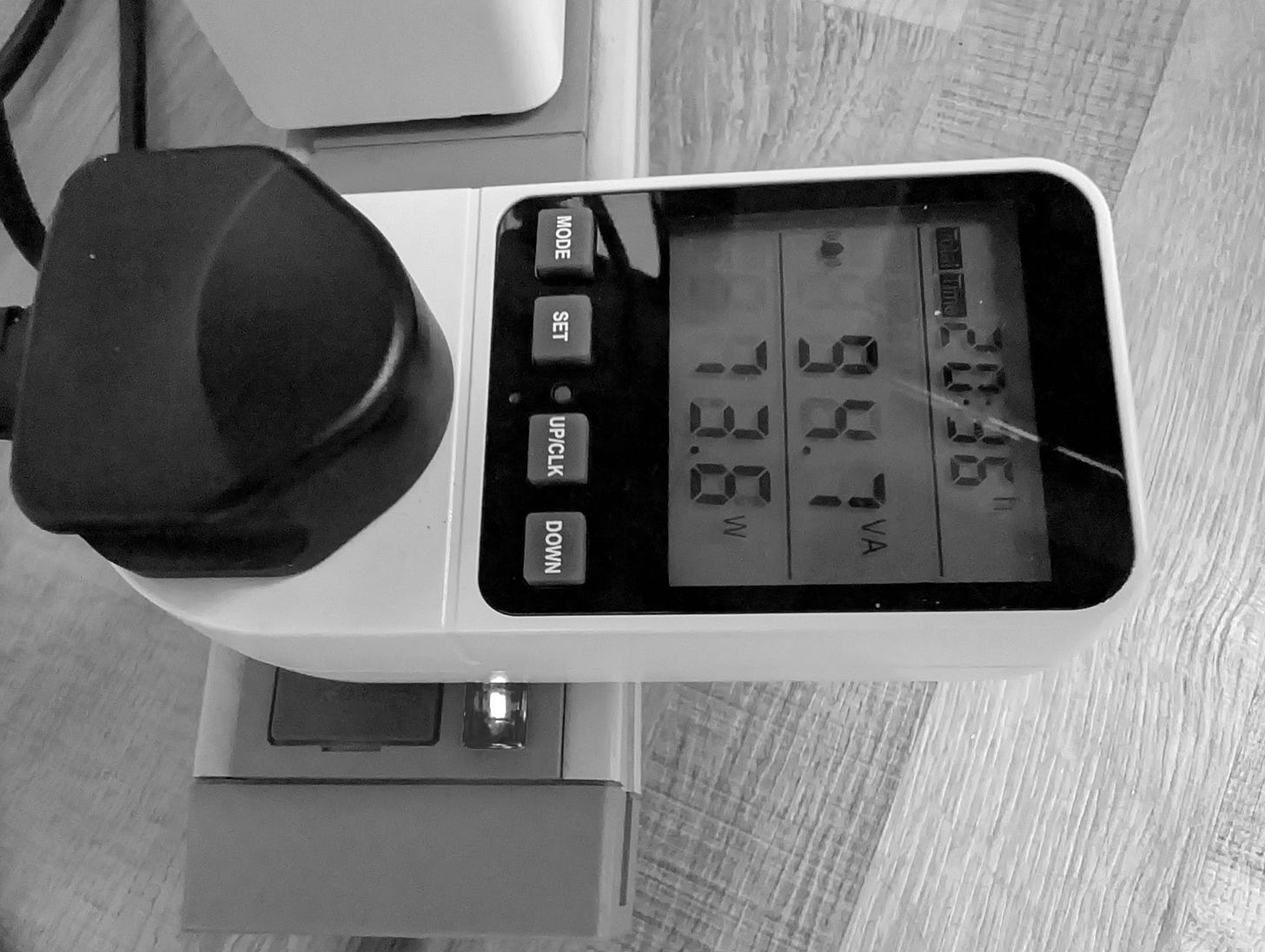 A plug power meter showing 70w usage for my PC