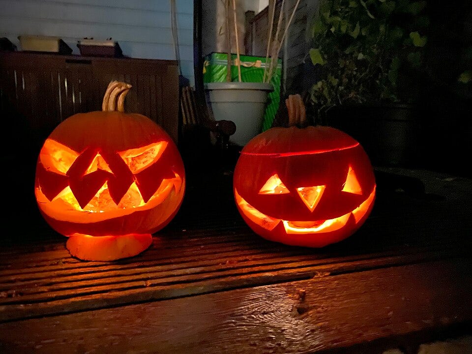 two jack-o-lanterns two jack-o-lanterns
