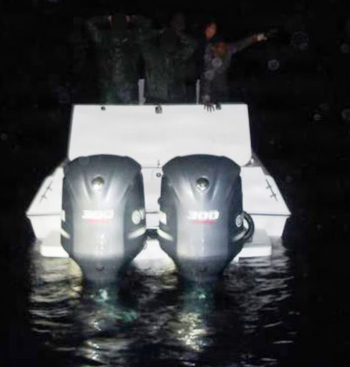 Cartel drug smugglers surrender to Coast Guard crewmen from the cutter “Alert” 