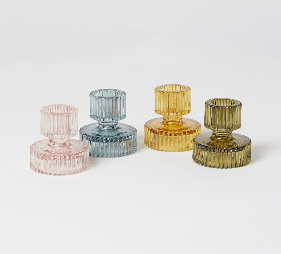 four pastel coloured ribbed glass candleholders