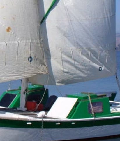 sailboat shelters on small voyaging canoes