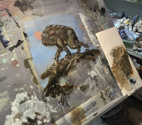 LEFT: Work-in-progress photo of TABLETOP RAMBLER on the board covering the drafting table. The figure, setting, and moon in the background are all present. CENTER: Figure detail of TABLETOP RAMBLER padding in profile along rocky terrain. Its front paw is poised to take a step, moving in unison with one back leg that has just parted from the ground. With long ear pinned back against its body, there’s a sense of motion. RIGHT: Facial detail of TABLETOP RAMBLER featuring the head of the creature with eyes glowing, a dot of green focused past the full salmon pink moon and off panel left.