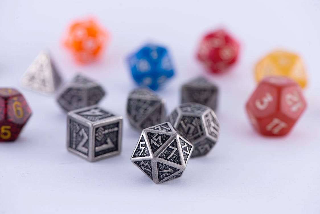 Polyhedral dice in various colours.