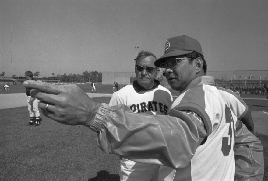 FILE - In this March 1975 file photo, Wally Yonamine, right, manager of the Chunichi Dragons, points out some of his players to Pittsburgh Pirates manager Danny Murtaugh as the two managers watched the team work out at the Pirates' spring training baseball camp in Bradenton, Fla. Yonamine, the first American to play professional baseball in Japan after World War II and a former running back with the San Francisco 49ers, died on Feb. 28, 2011. He was 85. (AP Photo/File)