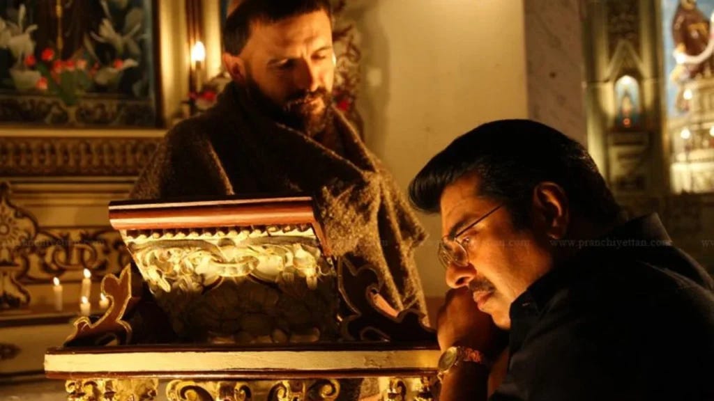 Pranchiyettan and the saint Pranchiyettan and the saint