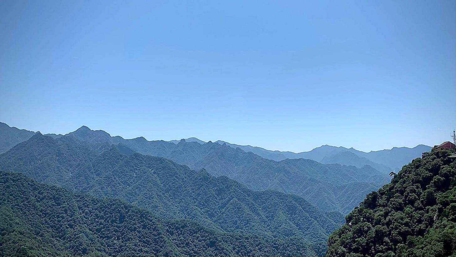 A view of Mt. Zhongnan 終南山 blue sky and continuous mountains A view of Mt. Zhongnan 終南山 blue sky and continuous mountains