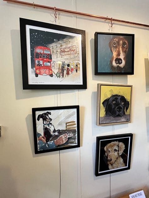 Photo of Dog portraits hung on the wall of the artist Jo Scotts Studio