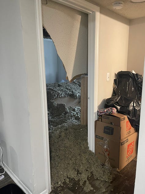 photos of the insulation and drywall filled bedroom after the ceiling collapsed.