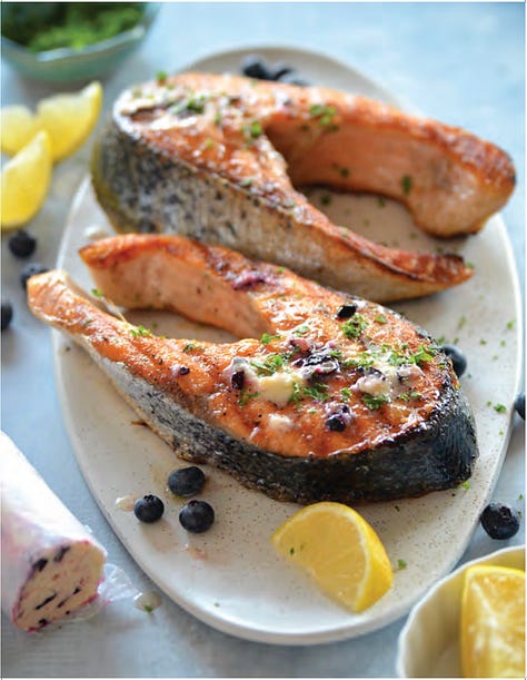 L to R: cover of For the Love of Seafood with pan cooked fish and a red pepper and papaya salsa, Grilled Salmon with Blueberry Ginger Butter and pan cooked Salmon with Savory Strawberry Sauce 