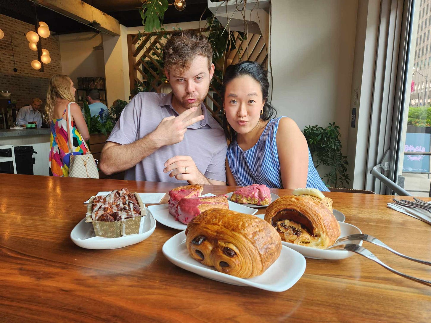 posing with pastries