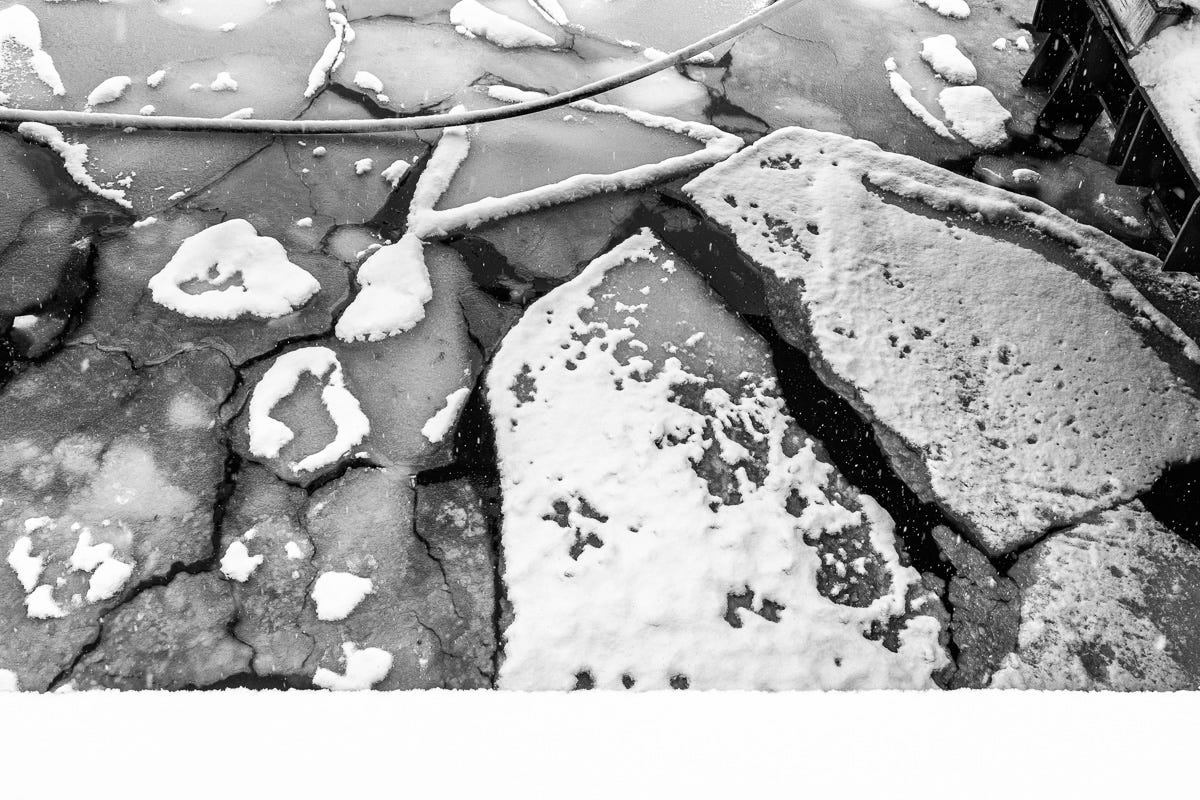 Quiet Fractures — Salt water, frozen briefly. Seaport, Boston, MA – February 2026