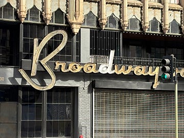 Photos of interiors and exteriors of historic theaters on Broadway in Los Angeles