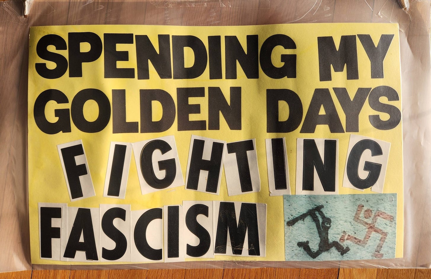 May be a graphic of ticket stub and text that says 'SPENDING MY GOLDEN DAYS FIGHTING HTING FASCISM 工州' May be a graphic of ticket stub and text that says 'SPENDING MY GOLDEN DAYS FIGHTING HTING FASCISM 工州'