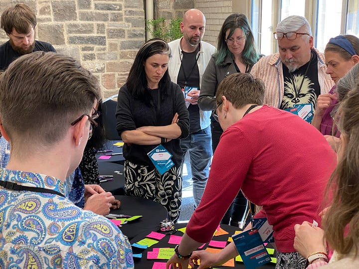 A table with post it notes describing concerns like engagement with people standing looking