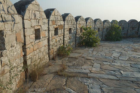 Images of the buildings and ramparts of the Nahargarh Fort in the late afternoon sun.