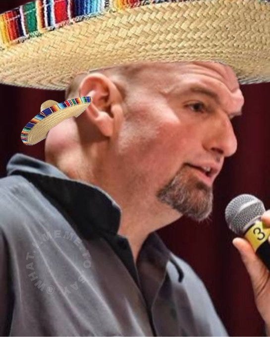 Chuck Schumer wearing a straw sombrero with colorful trim on his head and a smaller sombrero behind his ear. He is holding a microphone with a visible number 3 on it. A watermark reading "MEME" is present on his shirt.