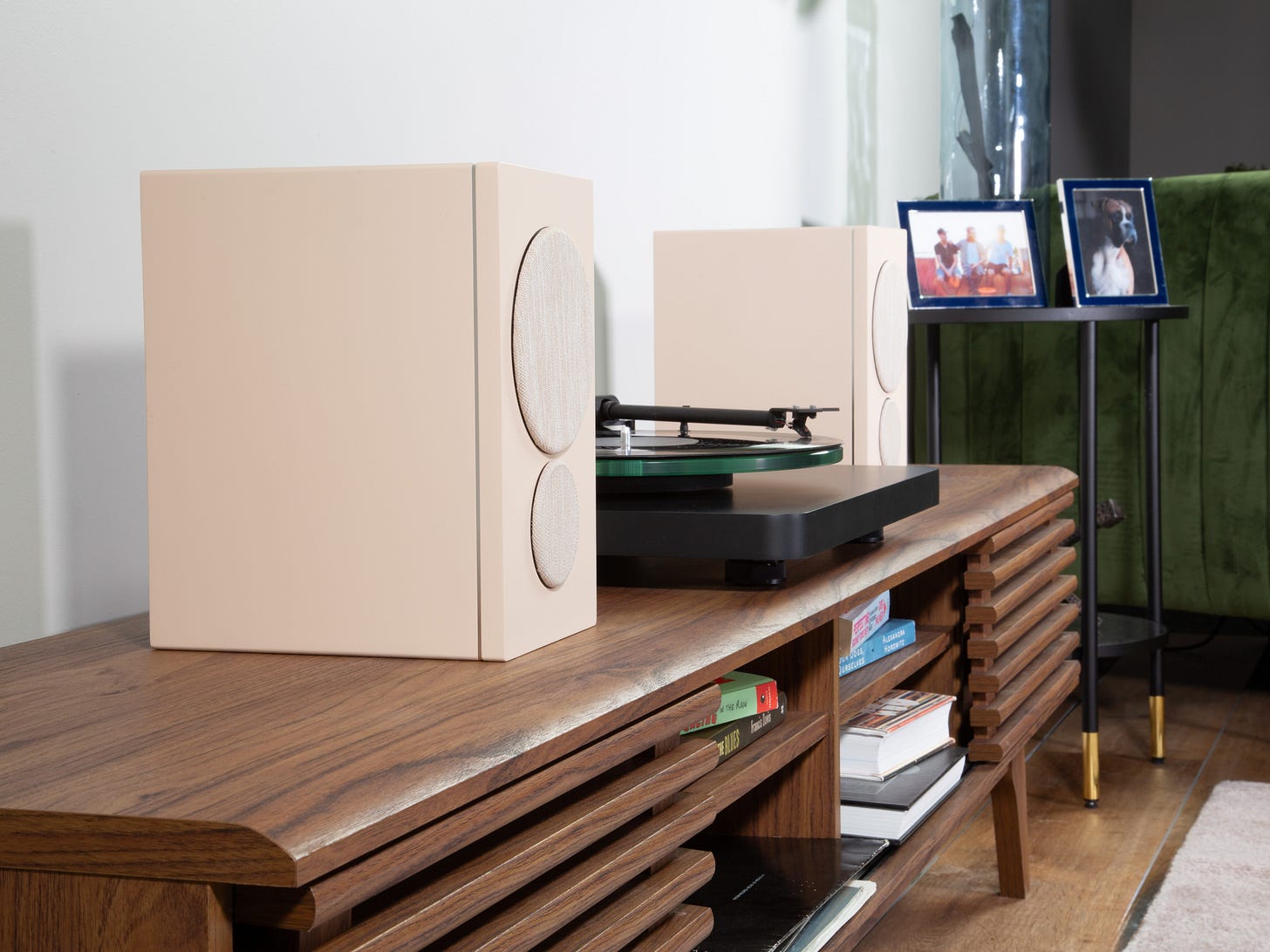 PSB iQ2 speakers in beige on a credenza with a turntable.