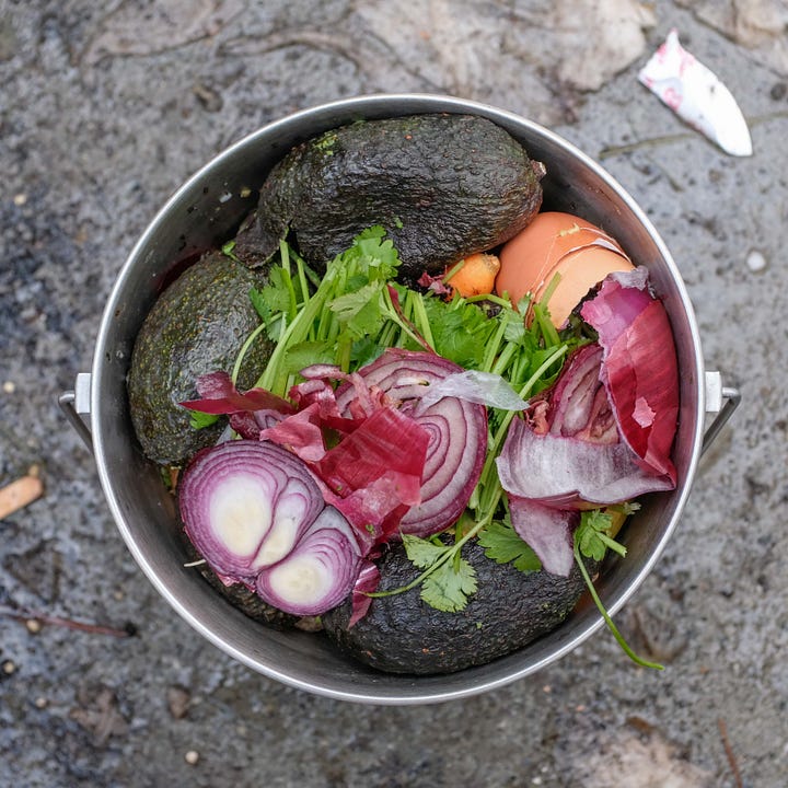 Diptych: Two buckets of colorful compost