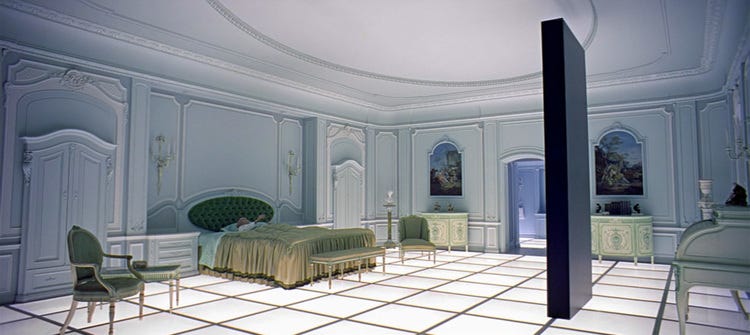 Louis XVI style room with a large black structure and glowing floors