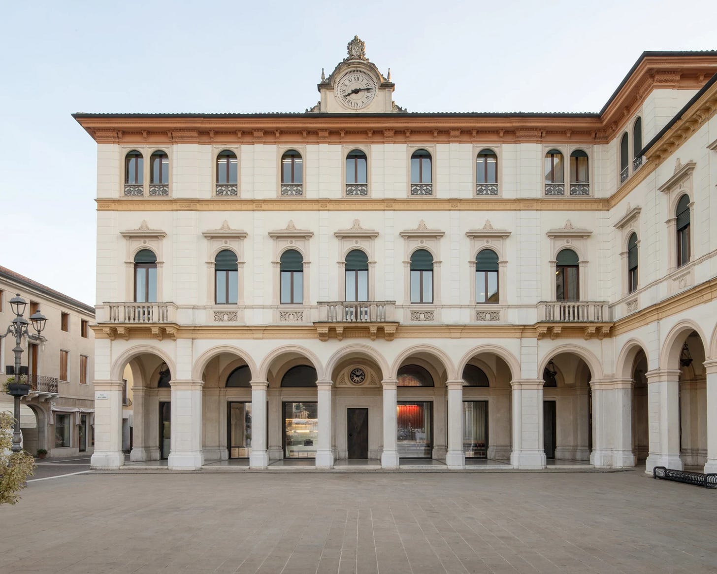 Caffè Nazionale by AMAA in Arzignano Italy, adaptive reuse of 19th-century palazzo with pleated stainless steel walls, okumè plywood ceiling and preserved historical patinas Caffè Nazionale by AMAA in Arzignano Italy, adaptive reuse of 19th-century palazzo with pleated stainless steel walls, okumè plywood ceiling and preserved historical patinas