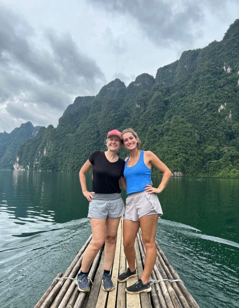 Mom and I enjoying a bamboo boat ride at the Koh Sok lake