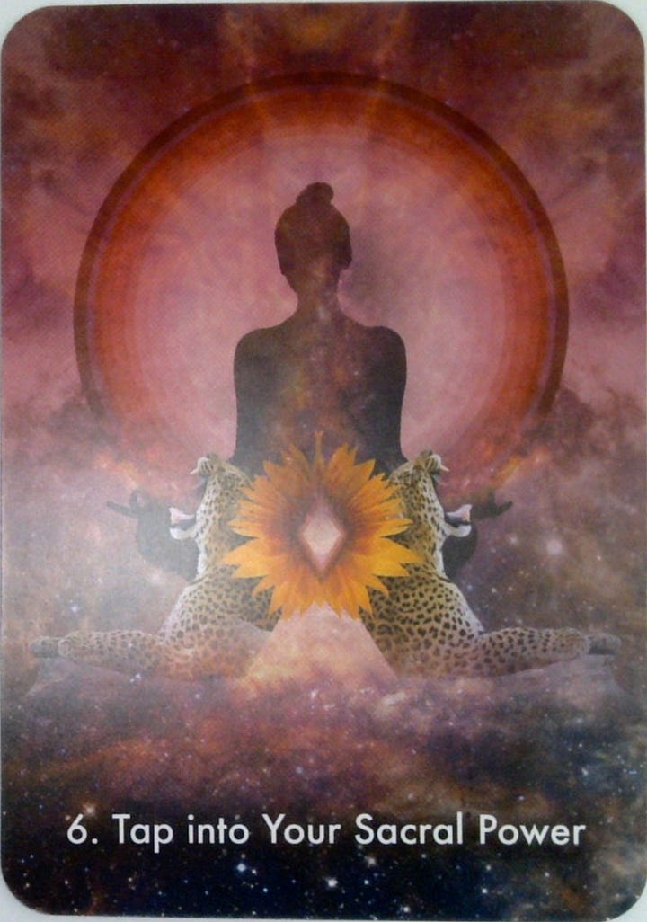 The Two of Swords tarot card and the Tap into Your Sacral Power oracle card.