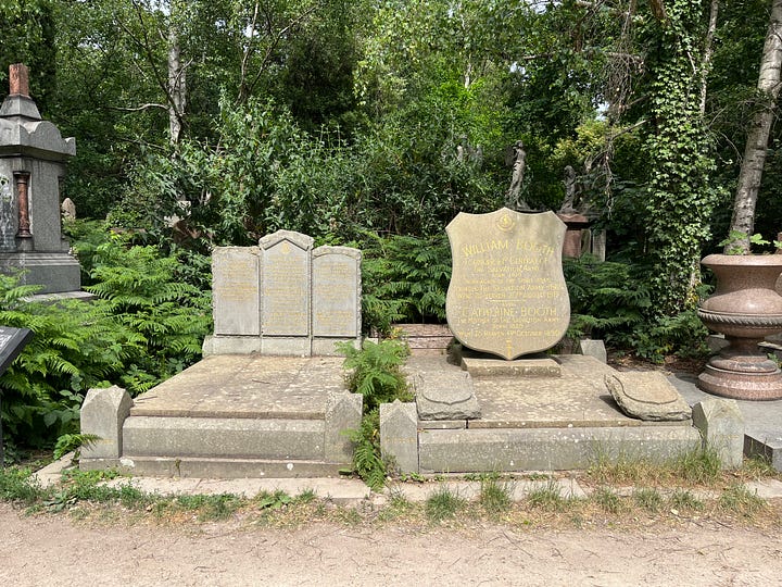 Large gravestones in the shape of the Salvation Army’s shield logo