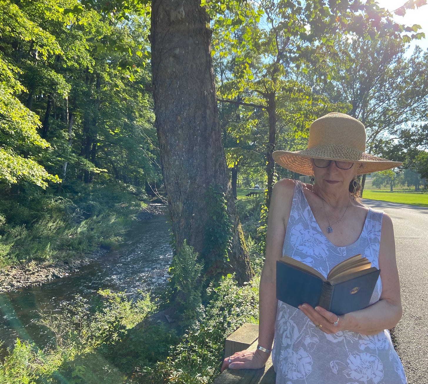 Jan M. Alexander reading by the north branch of the Raritan River, NJ.