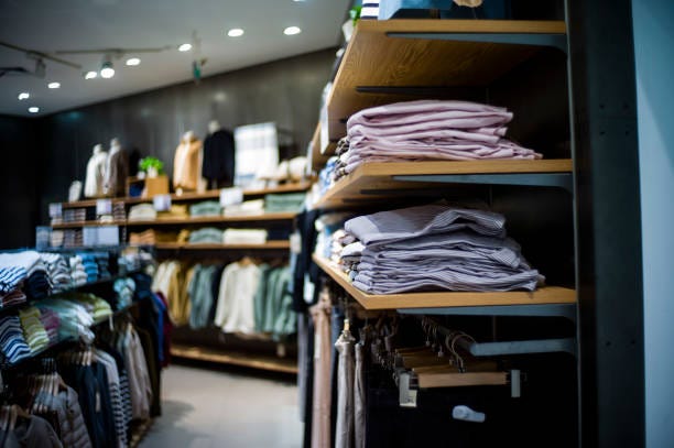 Clothing Store Clothing Store retail fixtures with too much inventory stock pictures, royalty-free photos & images