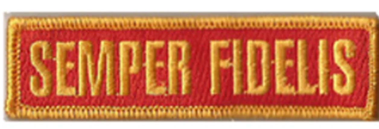 A red and gold patch with text

AI-generated content may be incorrect.