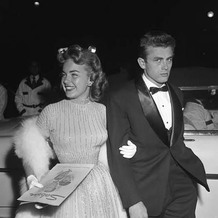 An unimpressed James Dean escorts Terry Moore to “Sabrina” in 1954. An unimpressed James Dean escorts Terry Moore to “Sabrina” in 1954.