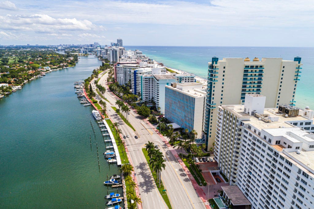 Miami Beach, Florida, aerial view, Indian Creek, Collins Avenue oceanfront, Capobella Condominium and Carriage Club North ...