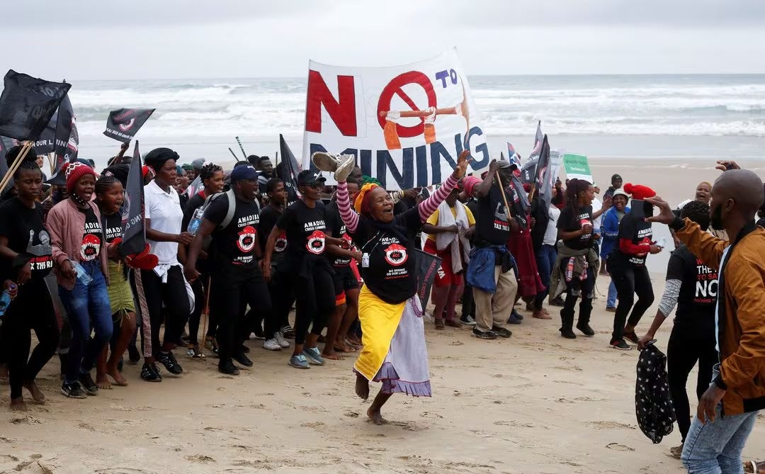 Wild Coast residents demonstrate against Royal Dutch Shell's plans to start seismic surveys to explore petroleum systems off the country's popular Wild Coast at Mzamba Beach, Sigidi, South Africa Wild Coast residents demonstrate against Royal Dutch Shell's plans to start seismic surveys to explore petroleum systems off the country's popular Wild Coast at Mzamba Beach, Sigidi, South Africa