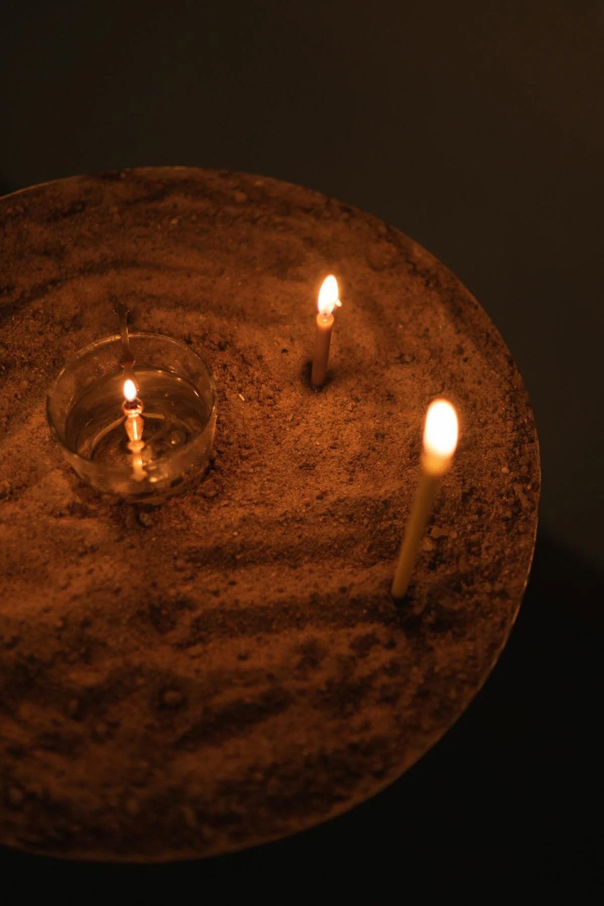 Two candles burning alone in a candle stand